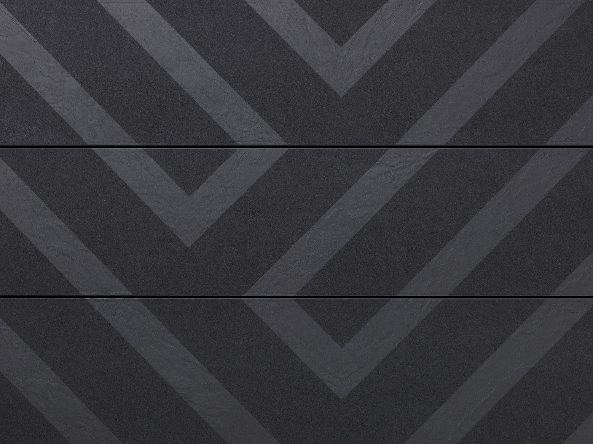 Millboard Modello Linear in Burnt Cedar: detail van het geometrische patroon over drie plankdelen