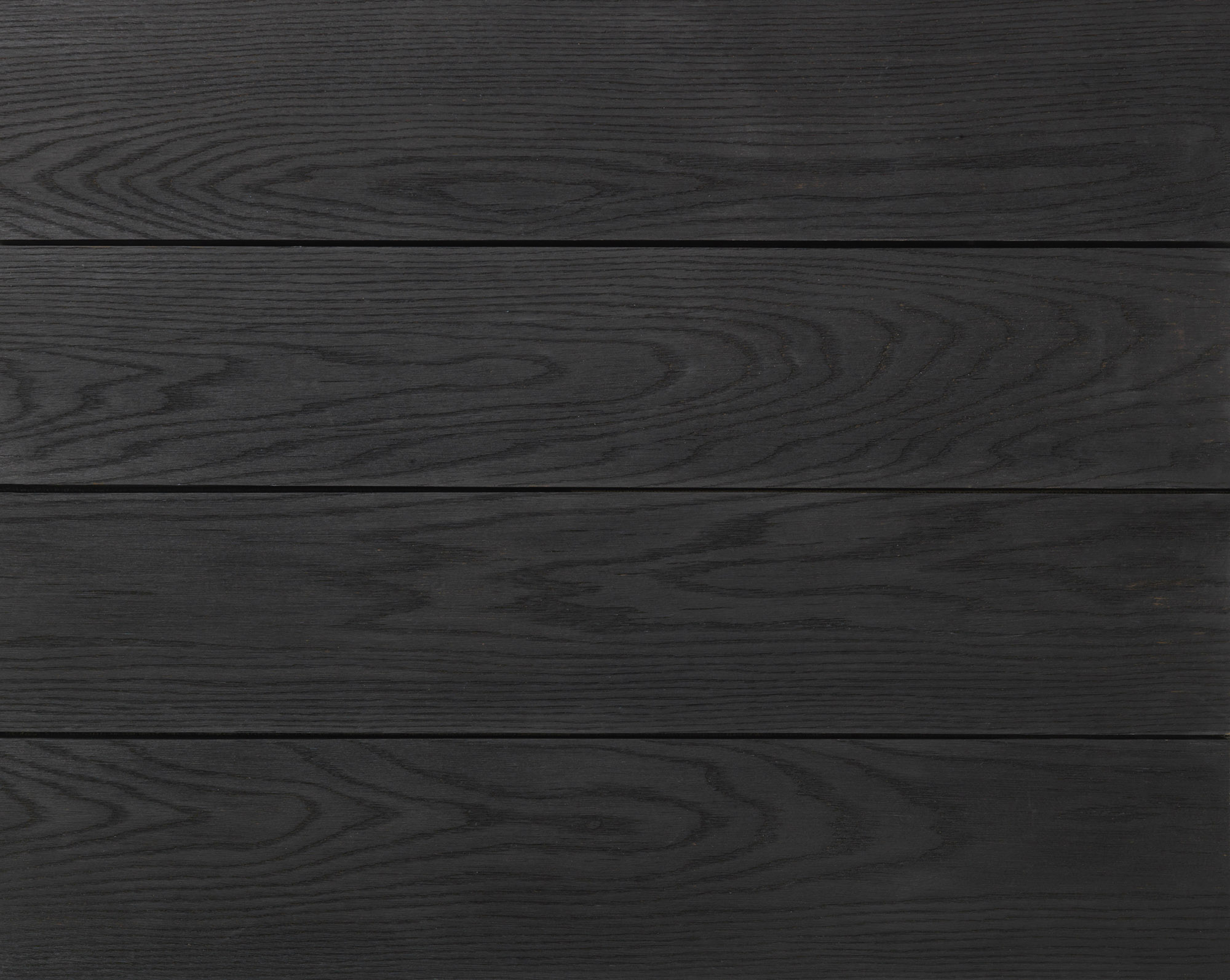 Millboard Enhanced Grain Burnt Cedar – bovenaanzicht van de houtnerf en het legbeeld